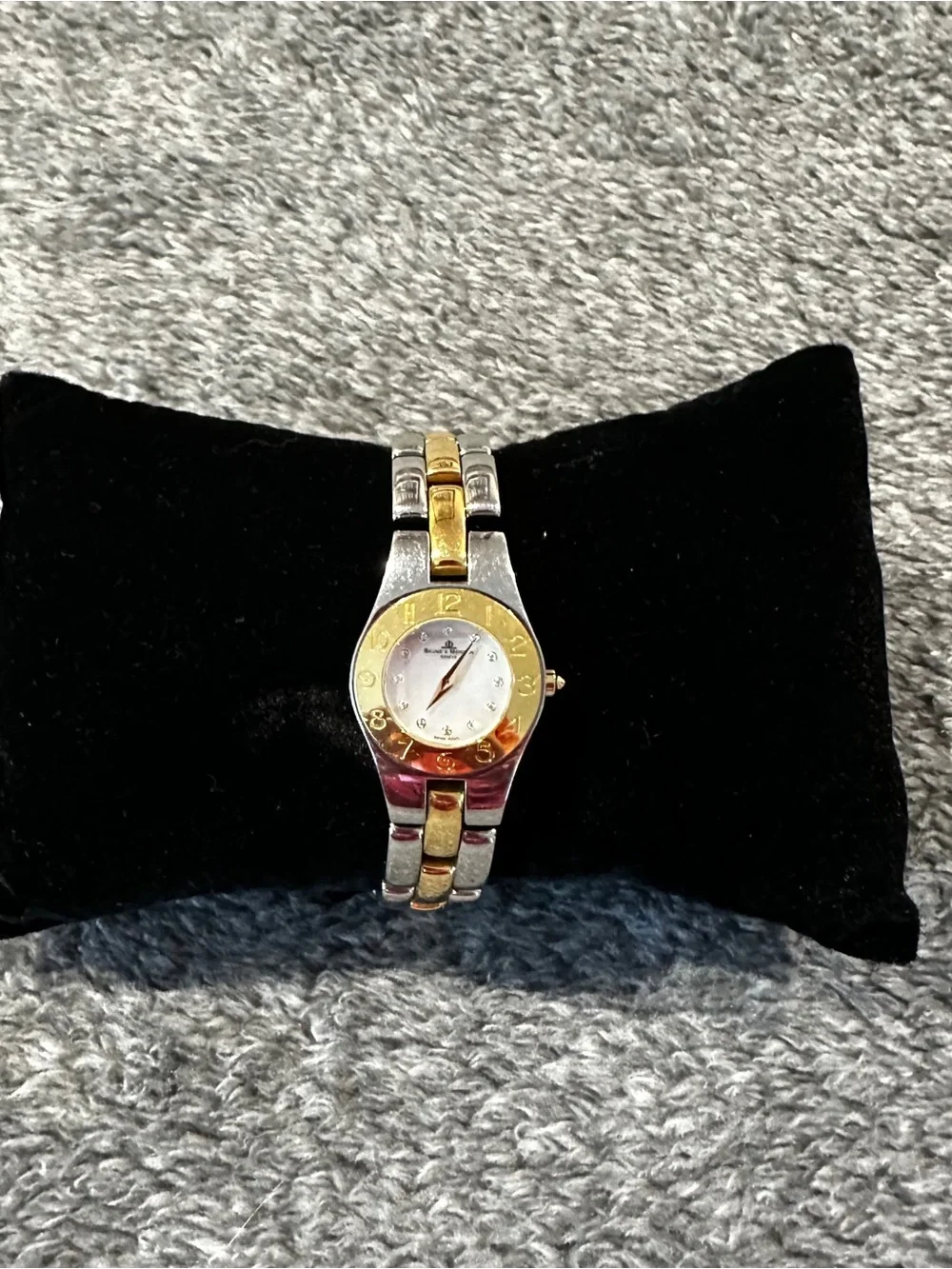 Baume & Mercier Linea 24mm two-toned 65304 watch w/ MOP face & diamond indices.